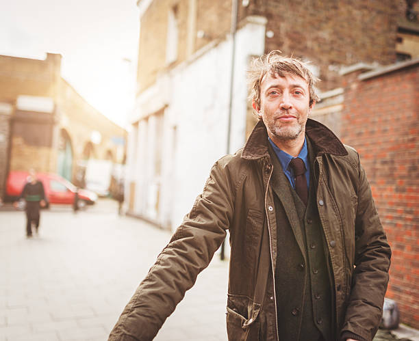 istock british business man on the bicycle 450213689