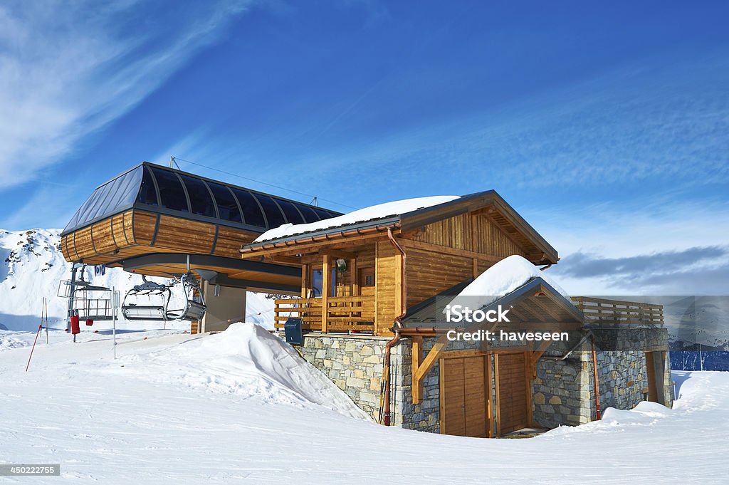 Ski lift station Ski lift station in mountains at winter, Meribel, Alps, France Courchevel Stock Photo