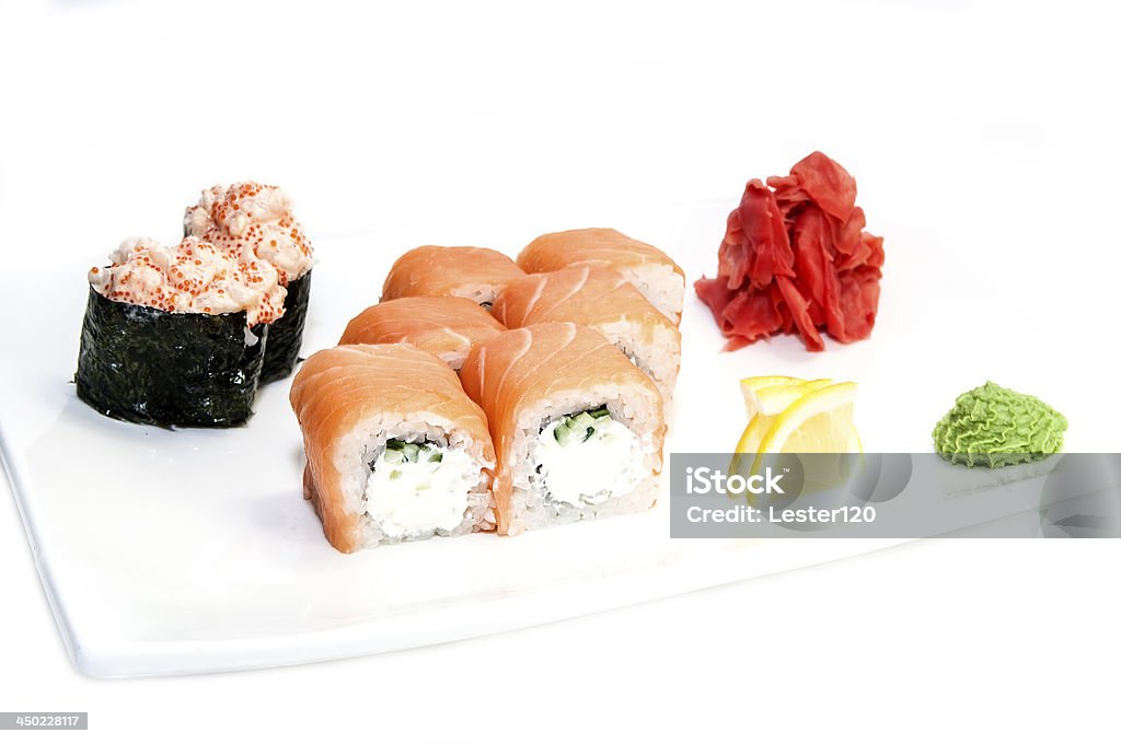 Japanese rolls Japanese rolls in a restaurant with fish and vegetables Appetizer Stock Photo