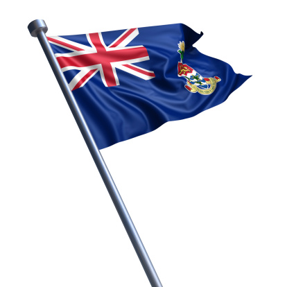 Flag of the Cayman Islands on modern metal flagpole.