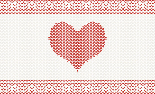 knitted christmas pattern with red heart