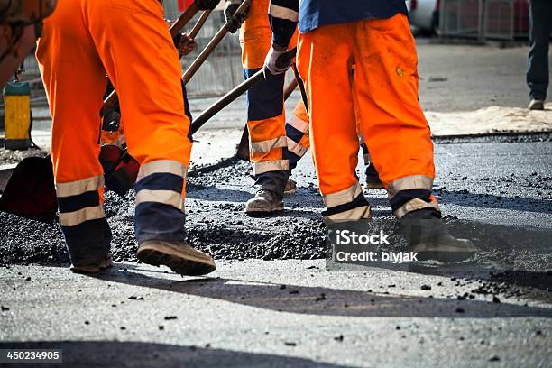 Workers On Road Construction Stock Photo - Download Image Now - Road Construction, Road, Construction Site