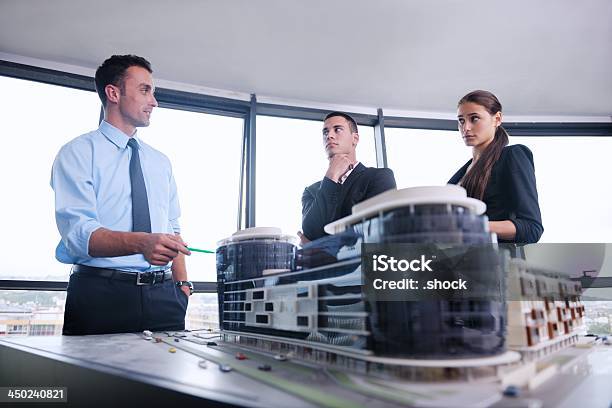 Business People And Engineers On Meeting Stock Photo - Download Image Now - Adult, Architect, Backgrounds