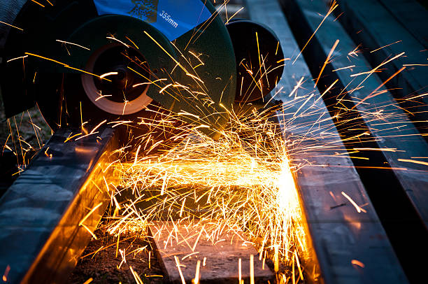istock cutting steel with grinder closeup 450241595