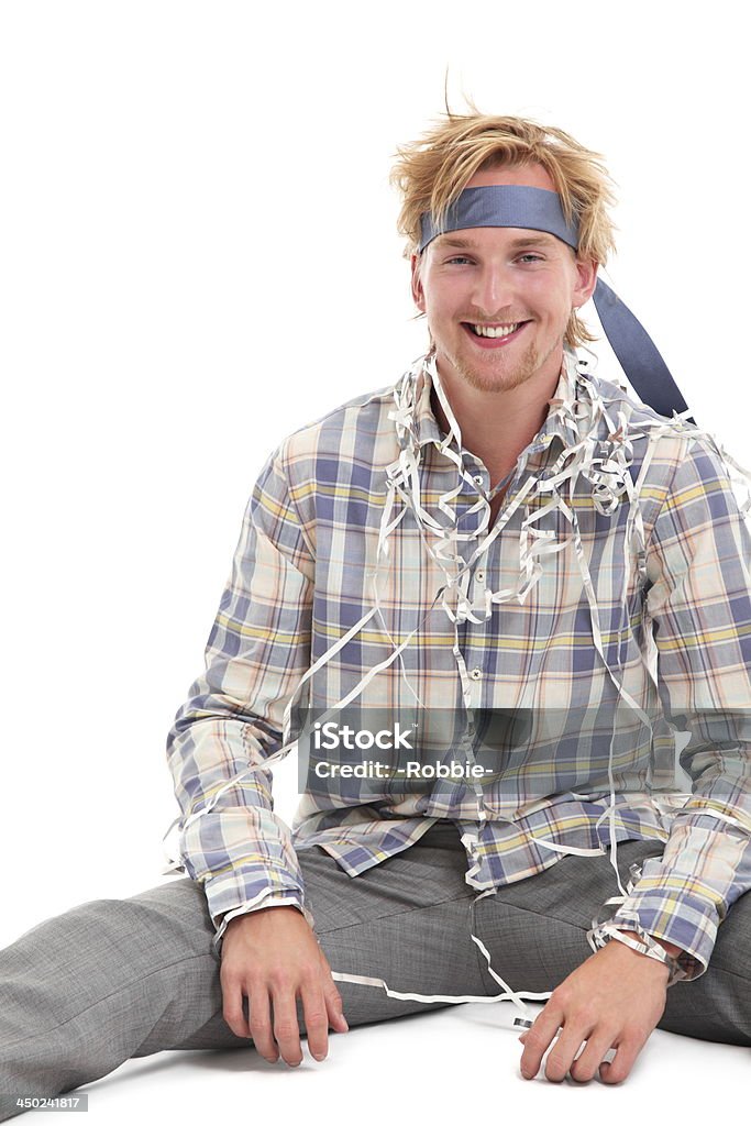 Dont you worry bout a thing! Party! Young attractive party guy with a tie around his head, wearing a shirt and grey pants. White background. 20-29 Years Stock Photo