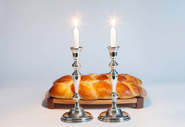 Shabbat Challah and candles for the Jewish Sabbath. jewish sabbath photos stock pictures, royalty-free photos & images