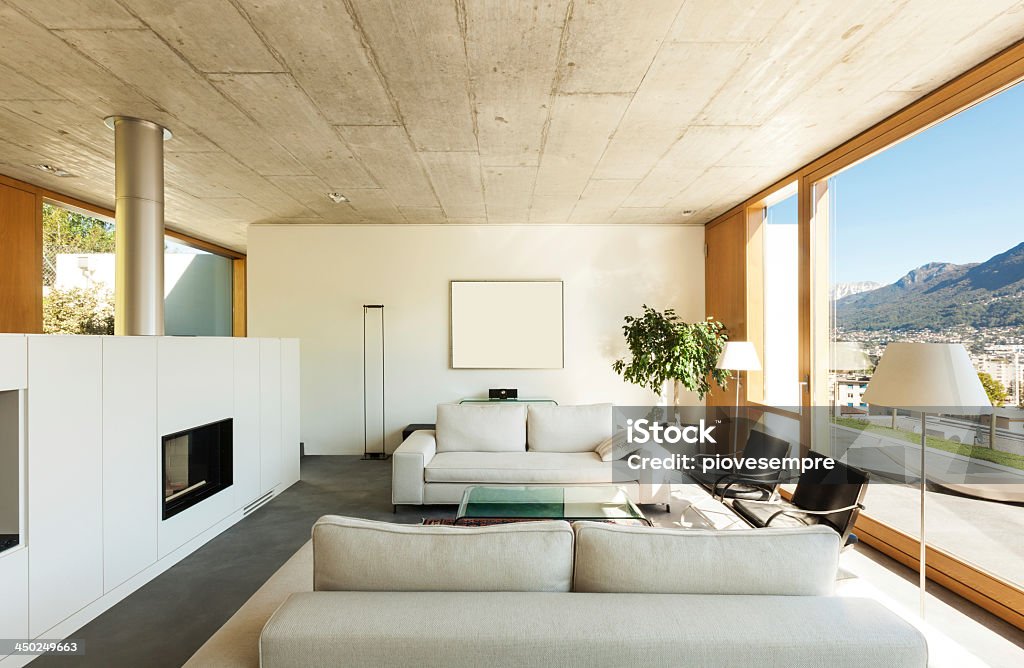 Overview of modern living room interior in cement beautiful modern house in cement, interiors, view from the living room Architecture Stock Photo