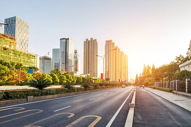 istock empty street in modern city 450251409
