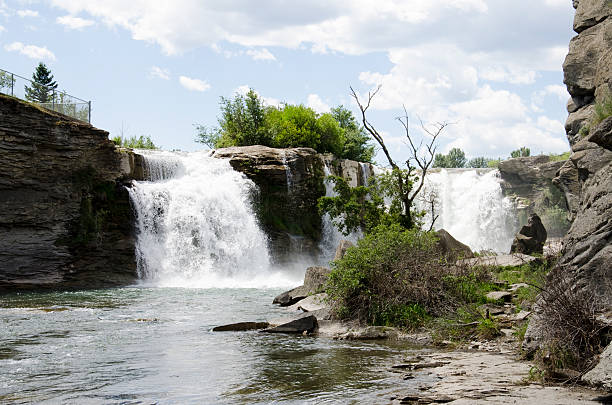 istock Lundbreck Falls splashes into Oldman River 450252227