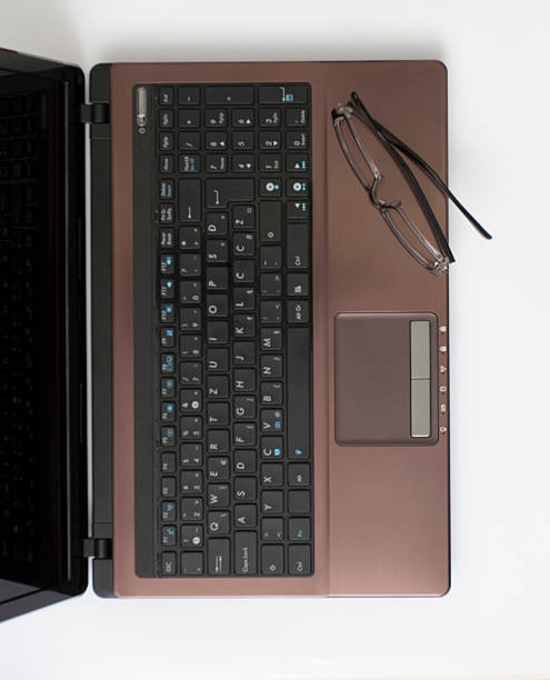 istock Laptop & Glasses on the Desk 450252443