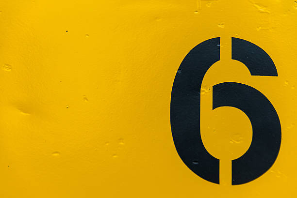 Number 6 on side of yellow metal train car