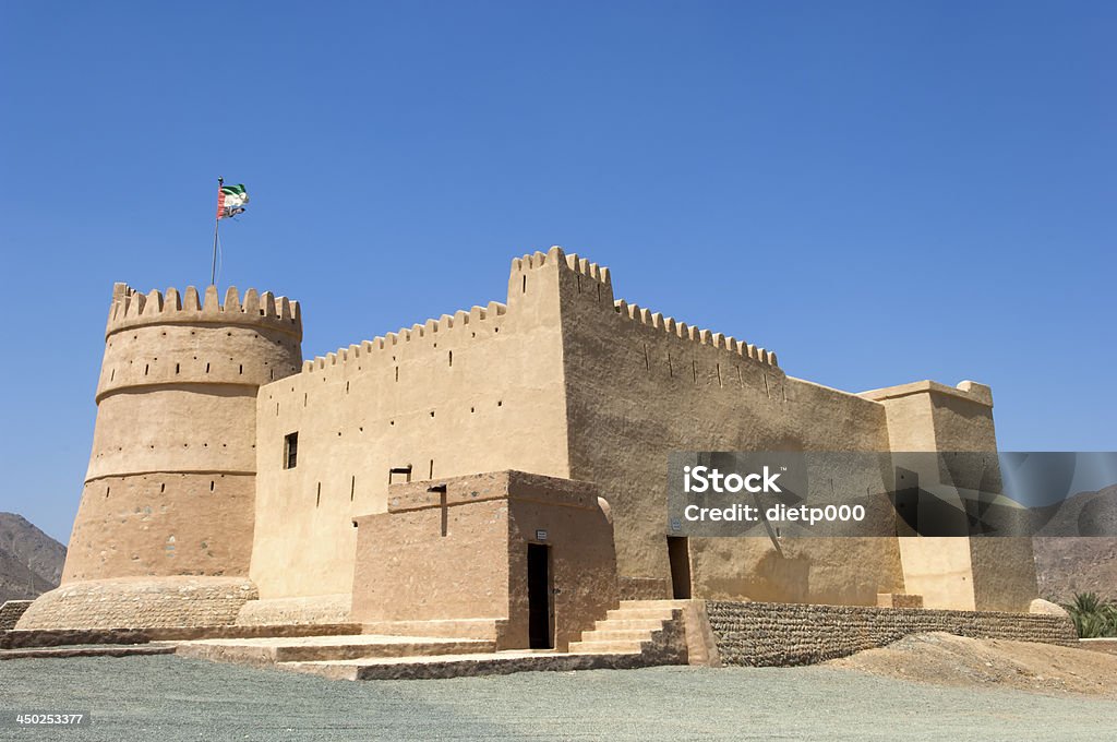 Ancient arabian fortress in Bithnah Fujairah, United Arab Emirates Al Bithna Fort is the second largest and most famous fort in Fujairah for its long history of wars and battles that took place in the region in the end of the 18th century and early 19th century. Emirate of Ajman Stock Photo