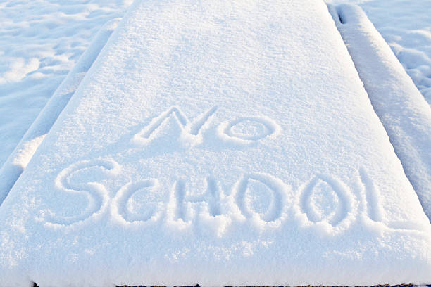 No School, two words outlined in snow stock photo