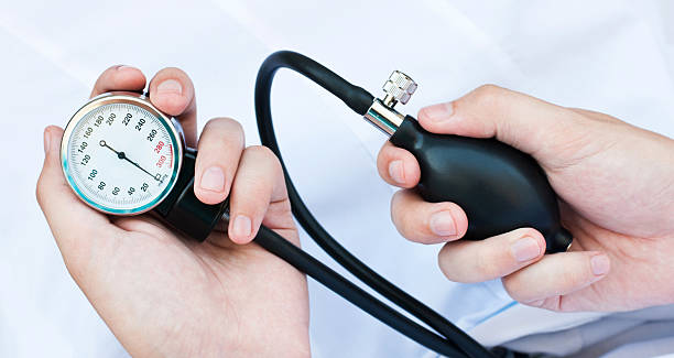 istock blood pressure gage in a doctor's hands 450255749