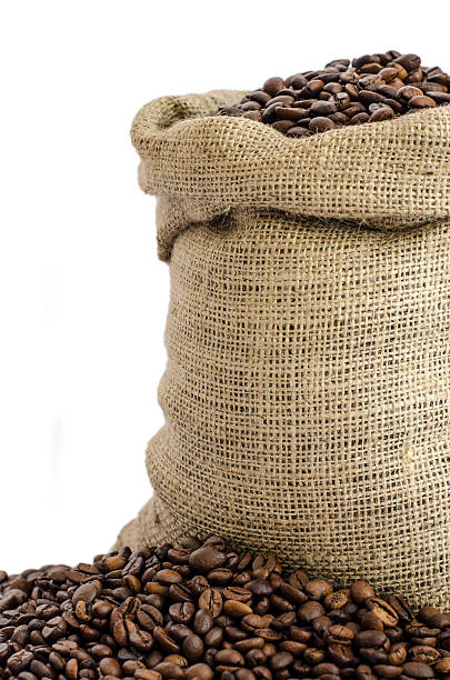 istock burlap bag of coffee beans isolated on white background 450263509