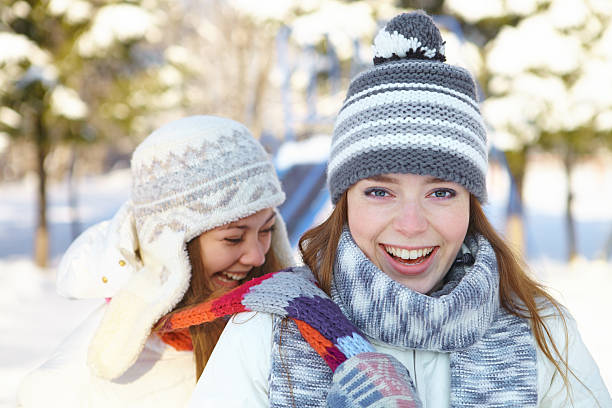 istock Winter. Young women outdoors. 450264795