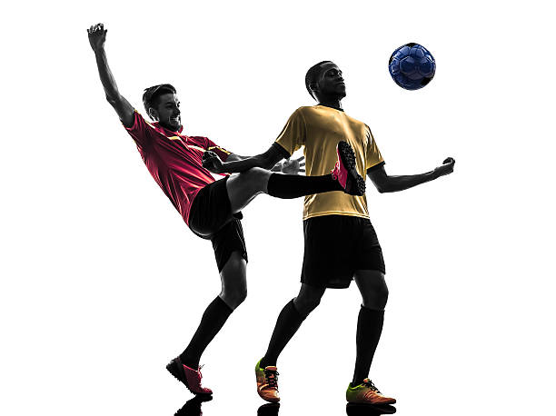 istock two men soccer players  standing silhouette 450272041