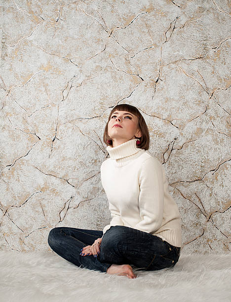 istock young woman in white jersey and jeans 450273587