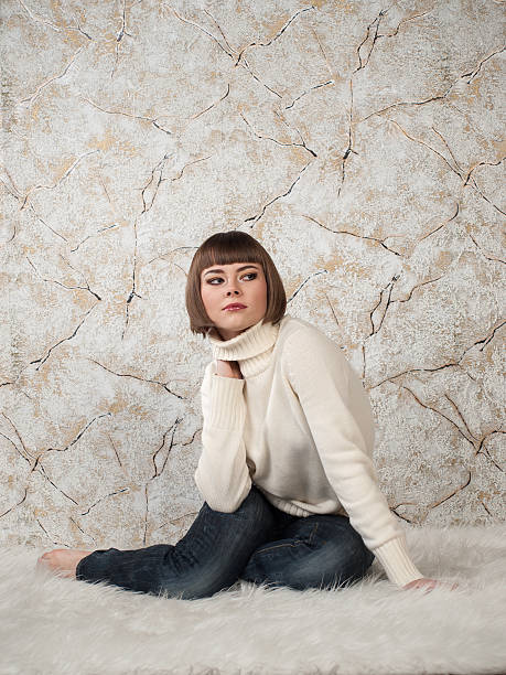 istock young woman in white jersey and jeans 450273727