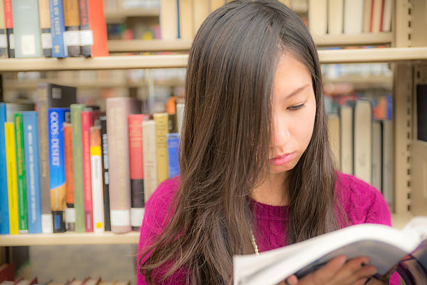 Woman in library stock photo