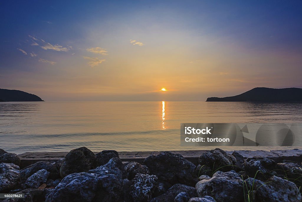 Morze i zachód słońca - Zbiór zdjęć royalty-free (Hawajczycy)