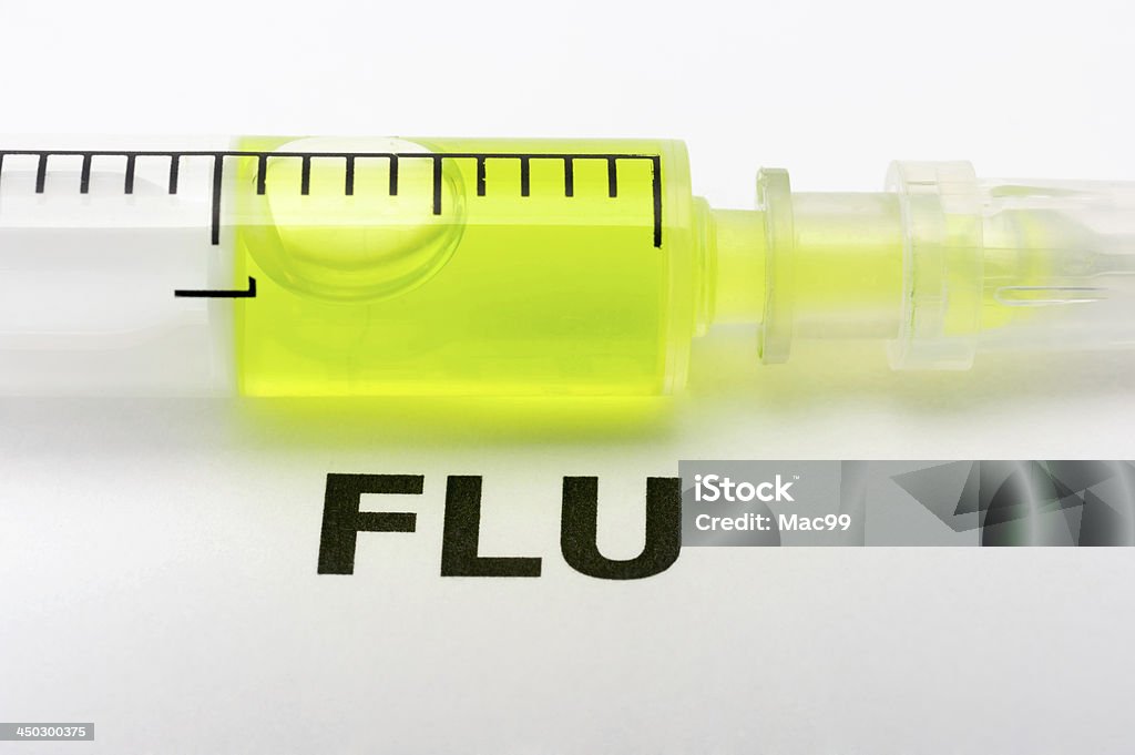 Seringue avec mot grippe - Photo de Blanc libre de droits