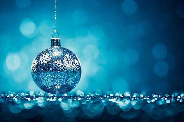 istock Blue Christmas Bauble - Glitter Bokeh Hanging Decoration 450301293