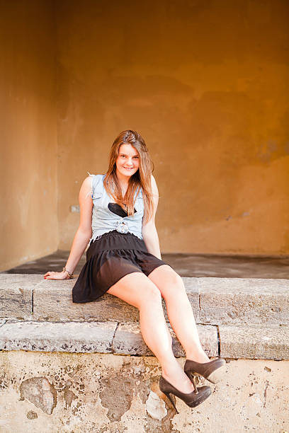 istock Elegant Girls Sitting on Stairs 450303881