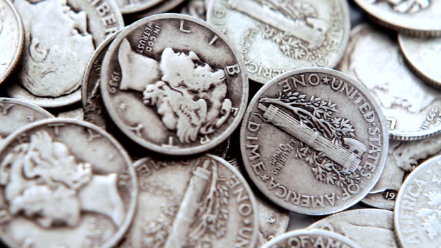 Pan over a pile of old silver dimes