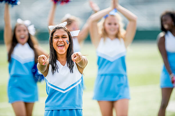 High school cheerleaders High school cheerleaders on the football field cheerleader photos stock pictures, royalty-free photos & images