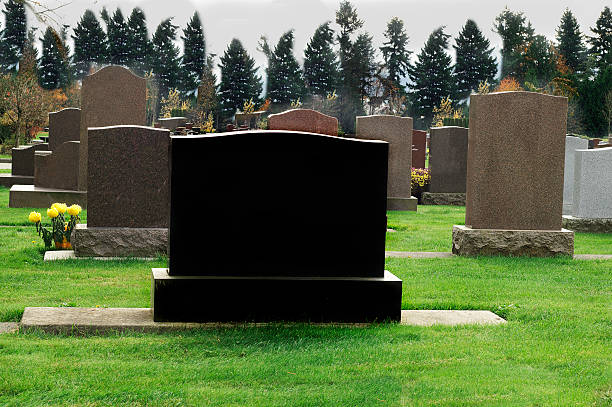 istock Dark Tombstone in Cemetery 450316645