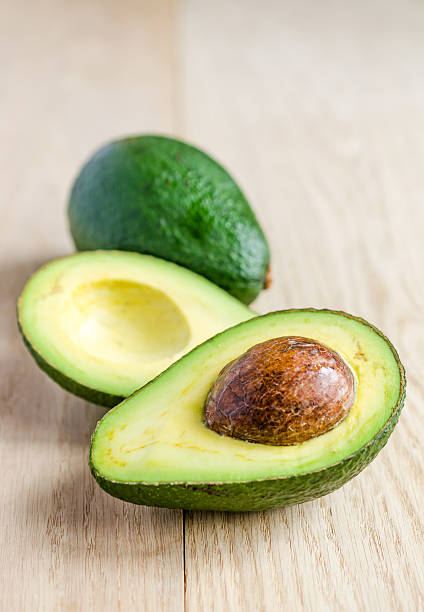 Avocado Avocado two objects vegetable seed ripe stock pictures, royalty-free photos & images