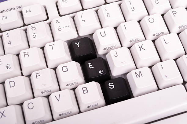 istock Word Yes written with black keys on computer keyboard. 450322967