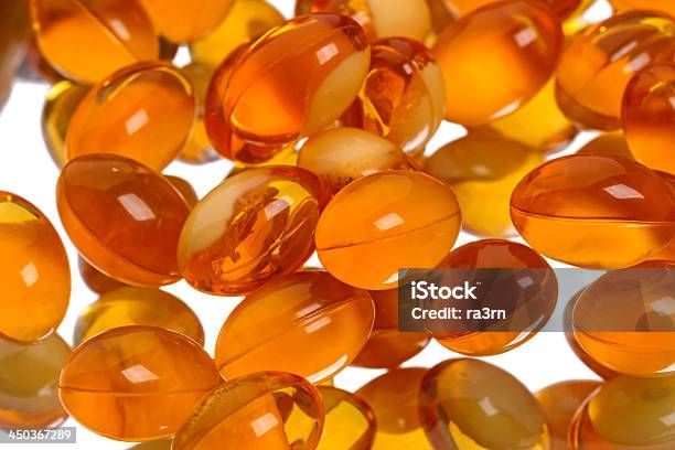 肝油タブレット - オレンジ色のストックフォトや画像を多数ご用意 - オレンジ色, カプセル剤, カラー画像