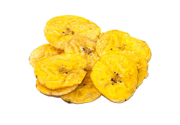 Plantain Chips Closeup of Plantain Chips isolated on a white background plantain stock pictures, royalty-free photos & images