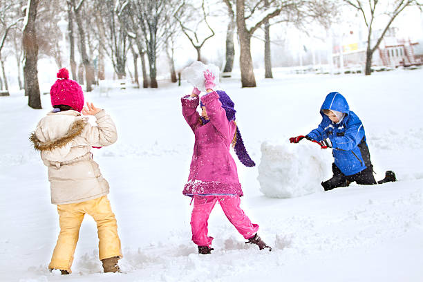 istock Happy family enjoying in winter 450392097