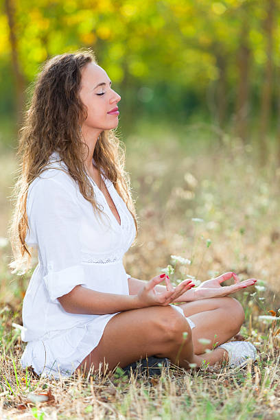 istock Beautiful Girl Doing Yoga Exercises 450397017