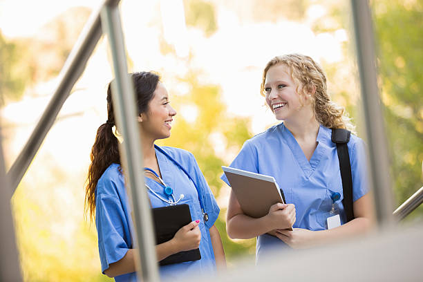 istock Nursing or medical students walking to class together on campus 450411693