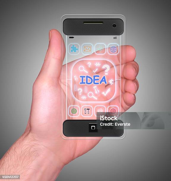 Transparent Mobile Smart Phone In Mans Hand Stock Photo - Download Image Now - Backgrounds, Biological Cell, Blank
