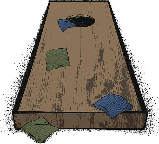 Old cornhole set Old weathered cornhole set with bean bags resting on the board. bean bag illustrations stock illustrations