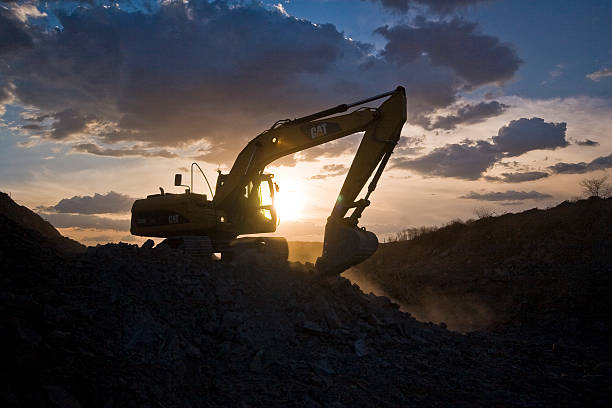 istock Transnordestina - Tractor at Sunset 450418119