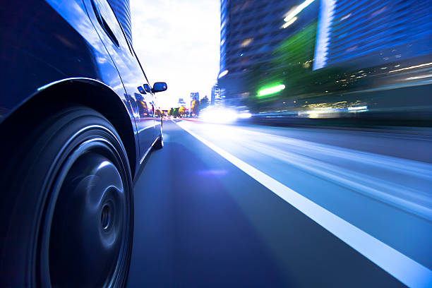 istock Driving in the sunset city. 450419273