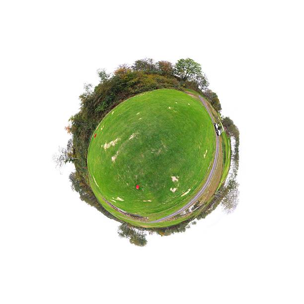 istock Little tiny planet golf course green field, Small world isolated 450425475