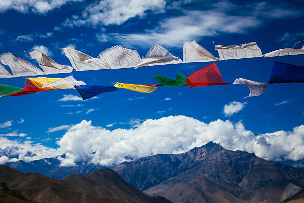 istock Prayer Flags fluttering high up in the mountains. 450432455