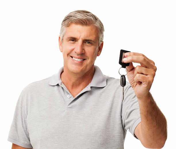 istock Confident Man Showing New Car Key 450435665