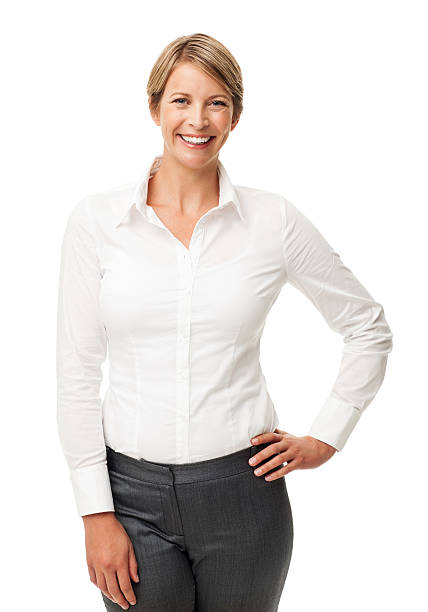 Portrait of happy smiling brunette girl dressed in white shirt. Beautiful model on isolated white background. Studio shot of young attractive woman in business suit.