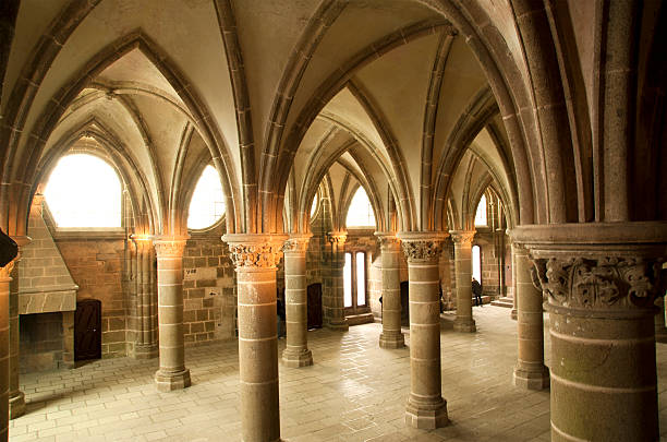 The cloister. Mont Saint-Michel, Normandy, France The cloister. Mont Saint-Michel, Normandy, France--one of the most visited tourist sites in France. Designated as one of the first UNESCO World Heritage Sites in 1979, the site has variously been a stronghold, monastery, prison and historic monument since 1874 cloister stock pictures, royalty-free photos & images