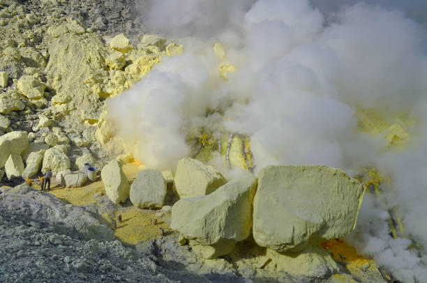 istock Sulphur mining. Ijen Crater crater 450452577