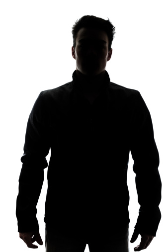 Male figure in silhouette wearing a vest isolated on white background
