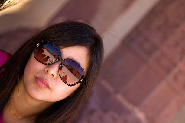 istock Beautiful Female wearing sunglasses 450470451